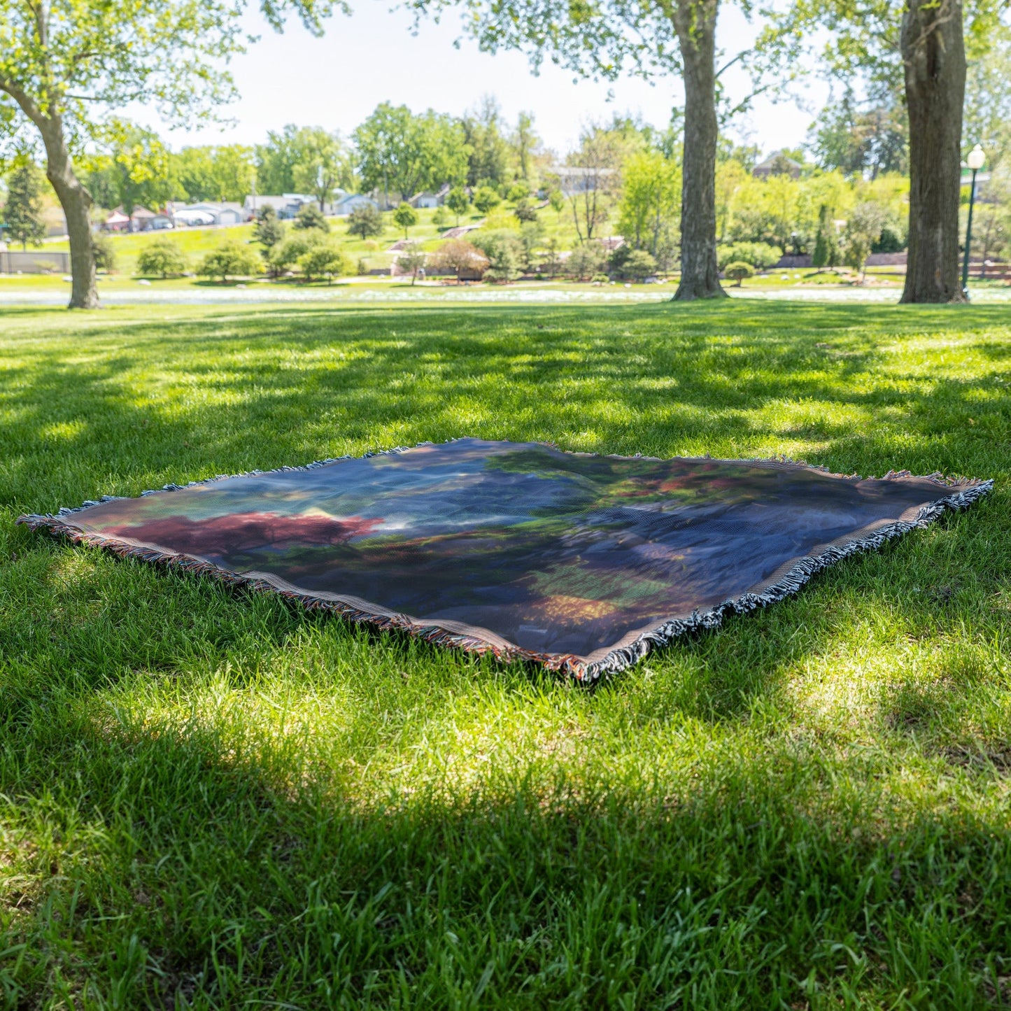 Scenic Mountain Stream with Vibrant Flowers and Sunset Woven Throw Blanket for Home Decor - Awakening Righteousness