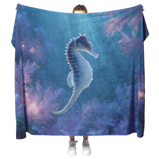 Blue_Eyed_Seahorse_Curled_Around_Glowing_H_Blanket_Model_Mockup.png
