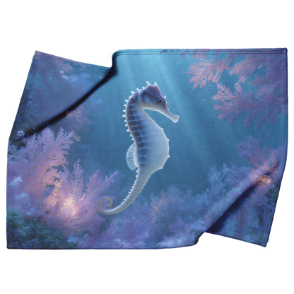 Blue_Eyed_Seahorse_Curled_Around_Glowing_H_Blanket_Top_Bottom_Folds_Mockup.png