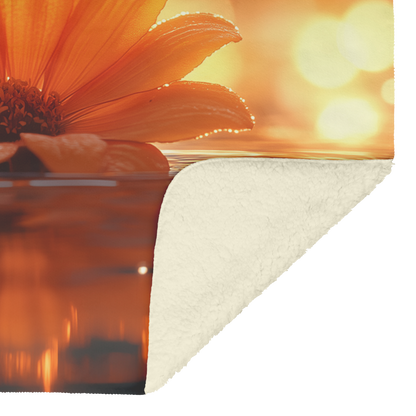 Glowing_Orange_Zinnia_Petals_on_Pond_wit_H_Blanket_Sherpa_Mockup.png