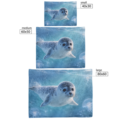 Seal_Pup_With_Blue_Eyes_Swimming_Alongsi_H_Blanket_Size_Options_Mockup.png