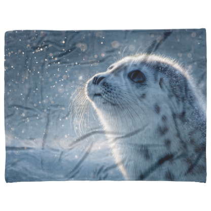 Seal_Pup_With_Sparkly_Blue_Eyes_Blowing__H_Blanket_AS_Flat_Mockup.png