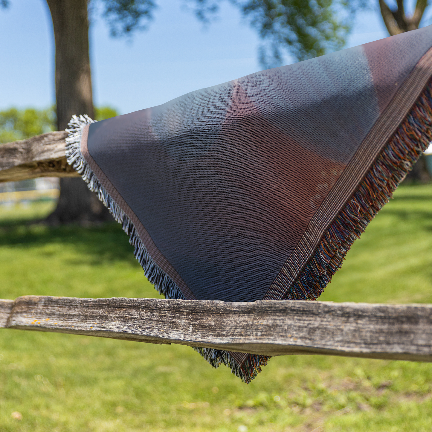 Serene_Daisy_Chain_Woven_Throw_Blanket_P_Fence_H_Mockup.png