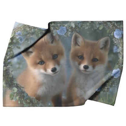 Two_Baby_Foxes_Cuddled_in_Heart_Shaped_R_H_Blanket_Top_Bottom_Folds_Mockup.png_15350432