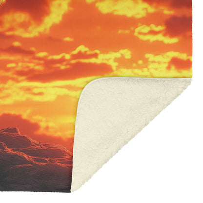 Alpha Wolf Standing Tall on Rocky Ledge Under Fiery Red Sunset Glowing Clouds Cozy Sherpa Blanket - Awakening Righteousness