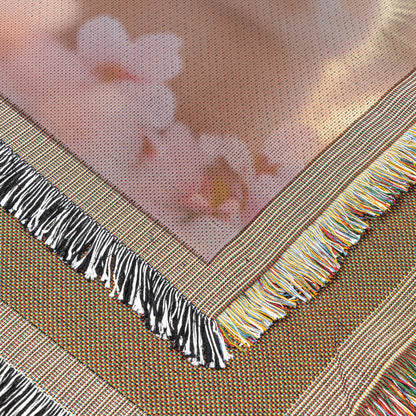 Baby Rabbits Playing Under Glowing Cherry Blossom Tree Woven Throw Blanket with Pink Petals and Soft Golden Light - Awakening Righteousness