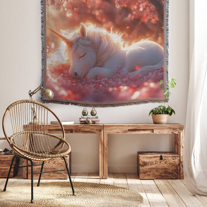 Baby Unicorn Resting Under Glowing Cherry Blossom Tree with Soft Pink Petals and Golden Sunlight Woven Throw Blanket - Awakening Righteousness