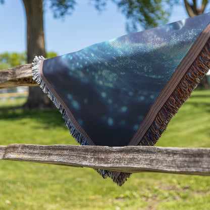 Dolphin Swimming Gracefully Through Bioluminescent Ocean with Glowing Blue and Green Light Trails Woven Throw Blanket - Awakening Righteousness