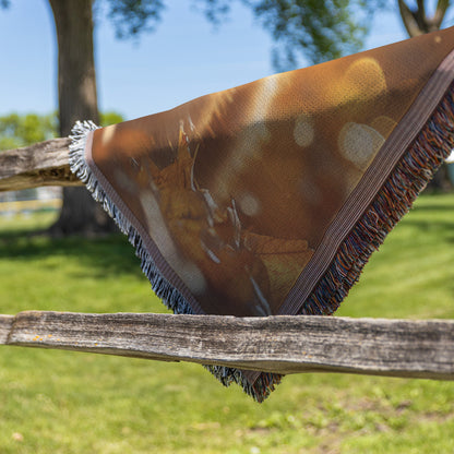 Orange Tabby Cat Surrounded by Glowing Autumn Leaves Under Warm Afternoon Sun with Intricate Fur Details Woven Throw Blanket - Awakening Righteousness