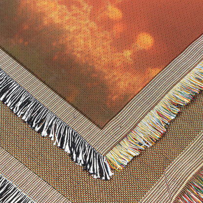 Peacock Silhouetted Against Golden Sunset on Hilltop with Soft Light Reflecting Vibrant Feathers Woven Throw Blanket - Awakening Righteousness