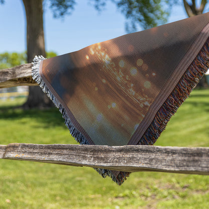 Peacock with Glowing Iridescent Feathers by Crystal Clear Pond Reflection Shimmering Under Twilight Sky Woven Throw Blanket - Awakening Righteousness