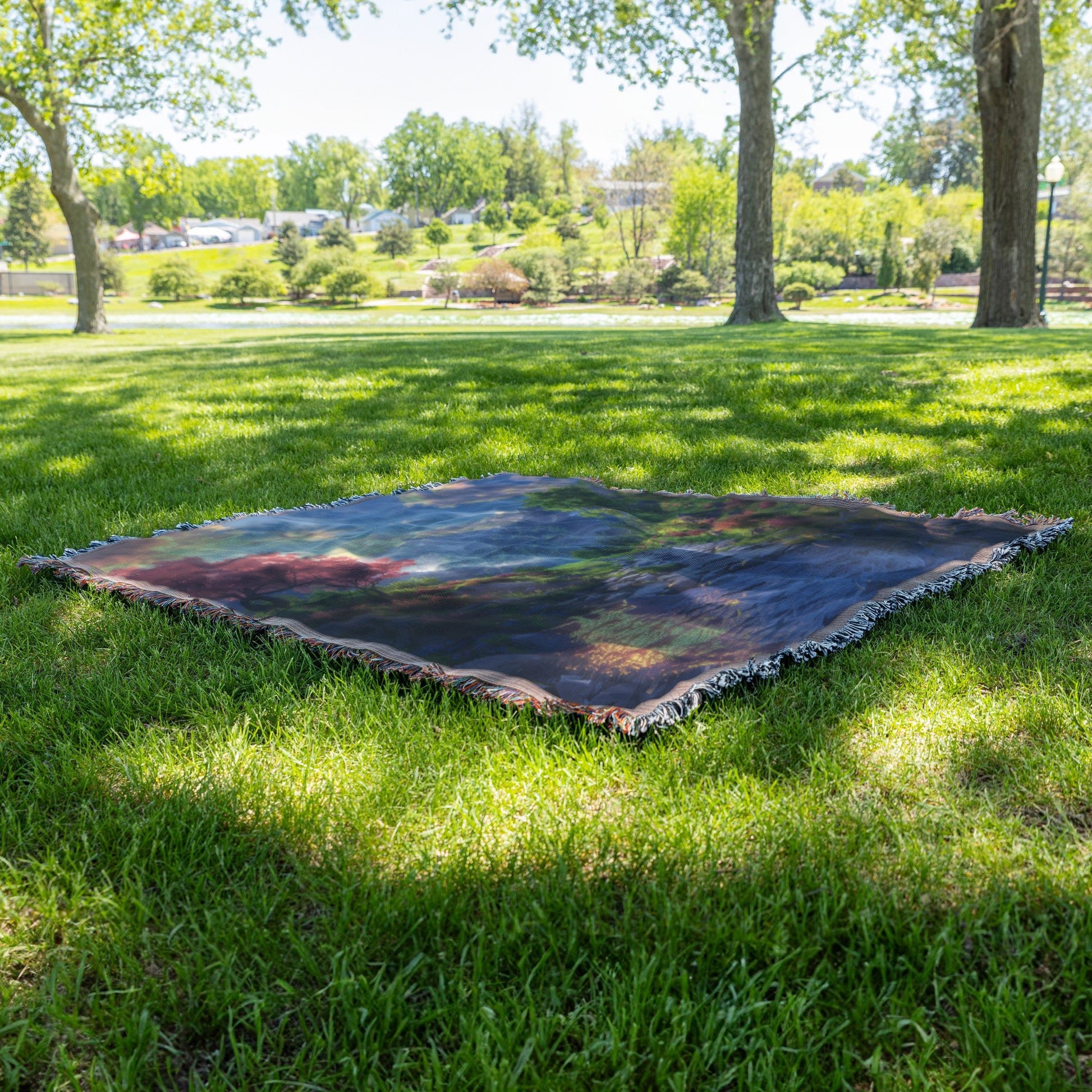 Scenic Mountain Stream with Vibrant Flowers and Sunset Woven Throw Blanket for Home Decor - Awakening Righteousness