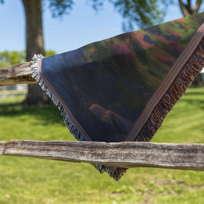Scenic Mountain Stream with Vibrant Flowers and Sunset Woven Throw Blanket for Home Decor - Awakening Righteousness