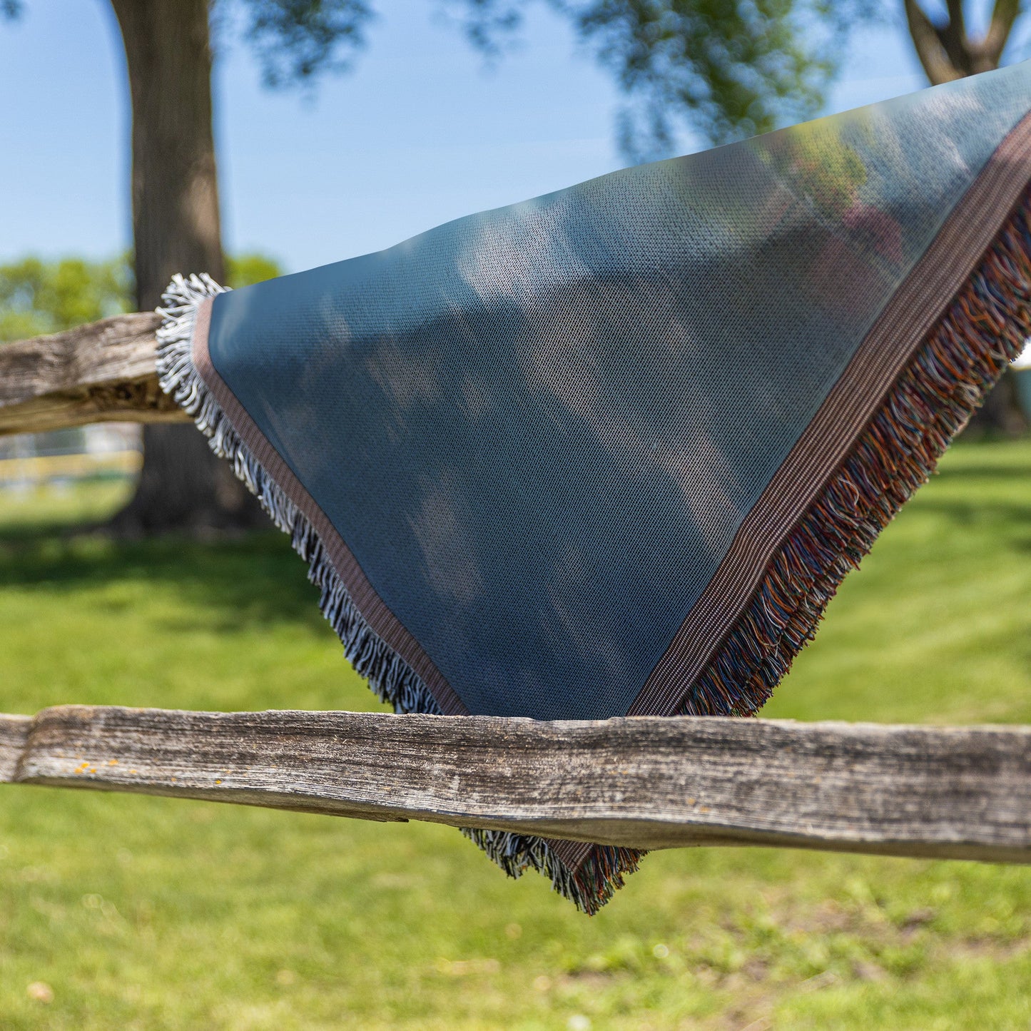 Serene Mountain Lake with Blooming Trees Woven Throw Blanket - Awakening Righteousness