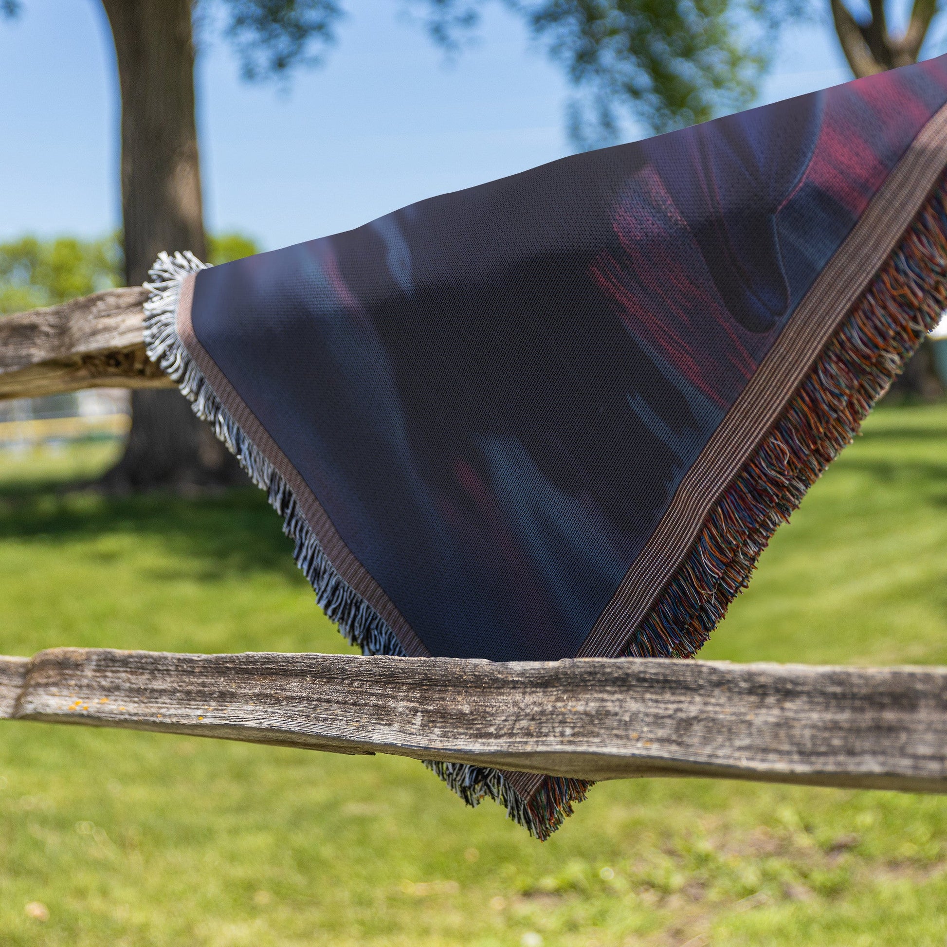 Two Dolphins Playing Under Glowing Pink and Purple Twilight Sky with Silhouettes Reflected on Calm Water Woven Throw Blanket - Awakening Righteousness