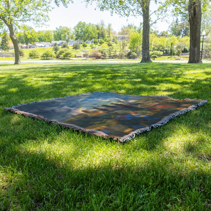 Woven Throw Blanket Featuring Children Enjoying a Rainbow Over a Flower Field with a Magical Sunset View - Awakening Righteousness